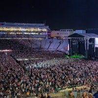 a large crowd at a concert at night